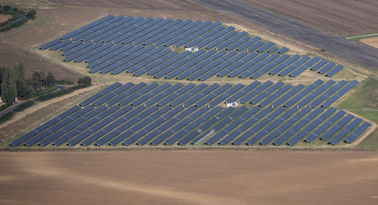 how many solar panels per acre